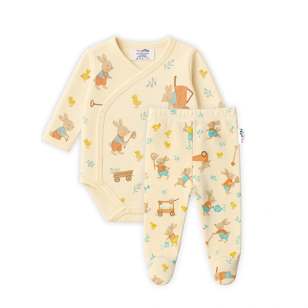 Kimono-style top and full-length footed bottoms from the starter kit, cream woodland animal print