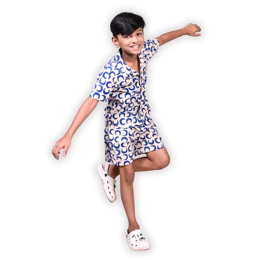 Child running in the Baghru shirt and shorts set