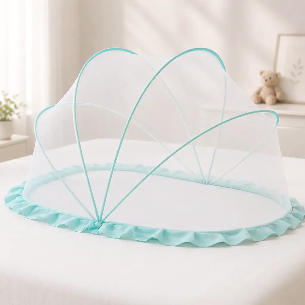 Mint green pop-up baby mosquito net opened on a bed