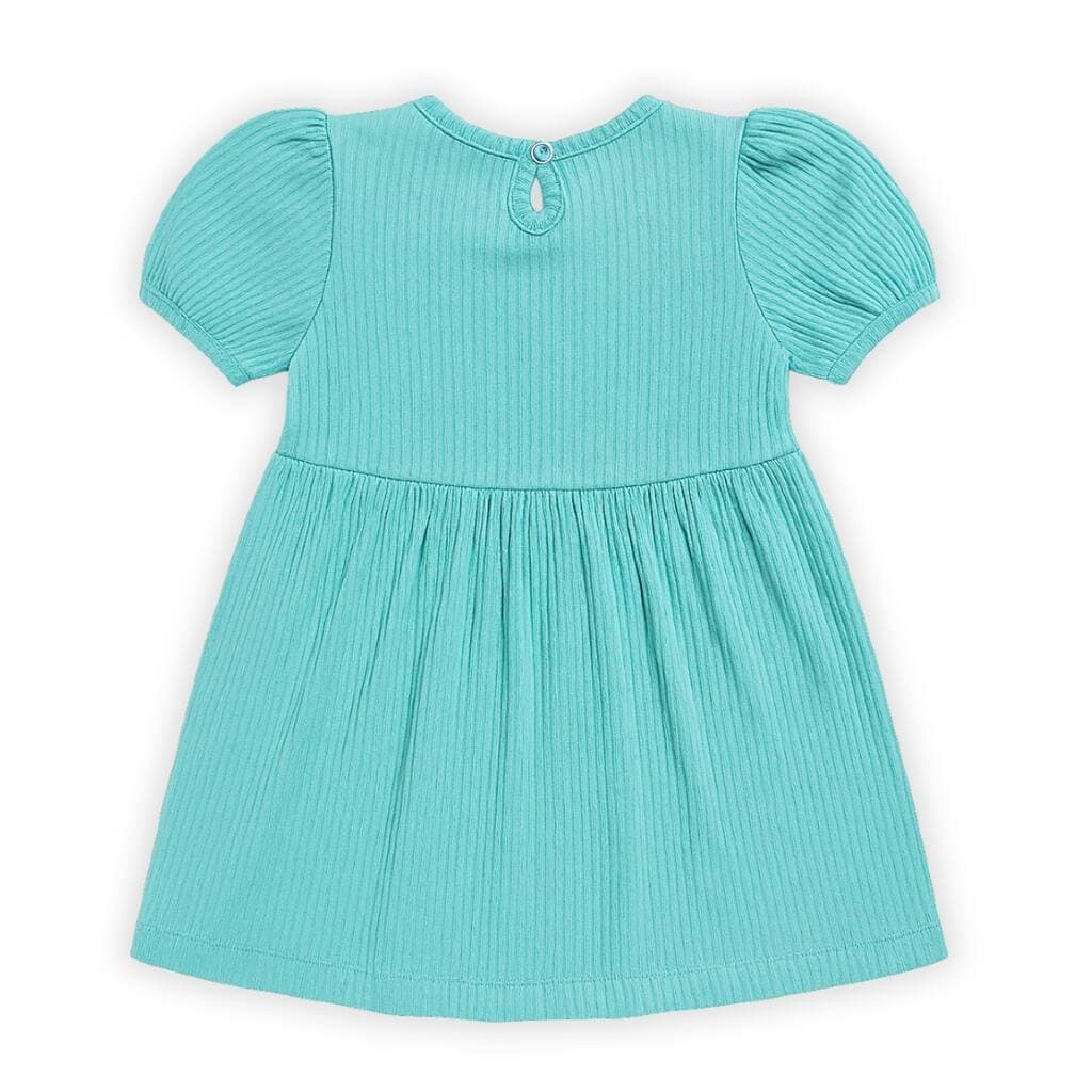 Back of the turquoise Doria frock showing the snap button closure