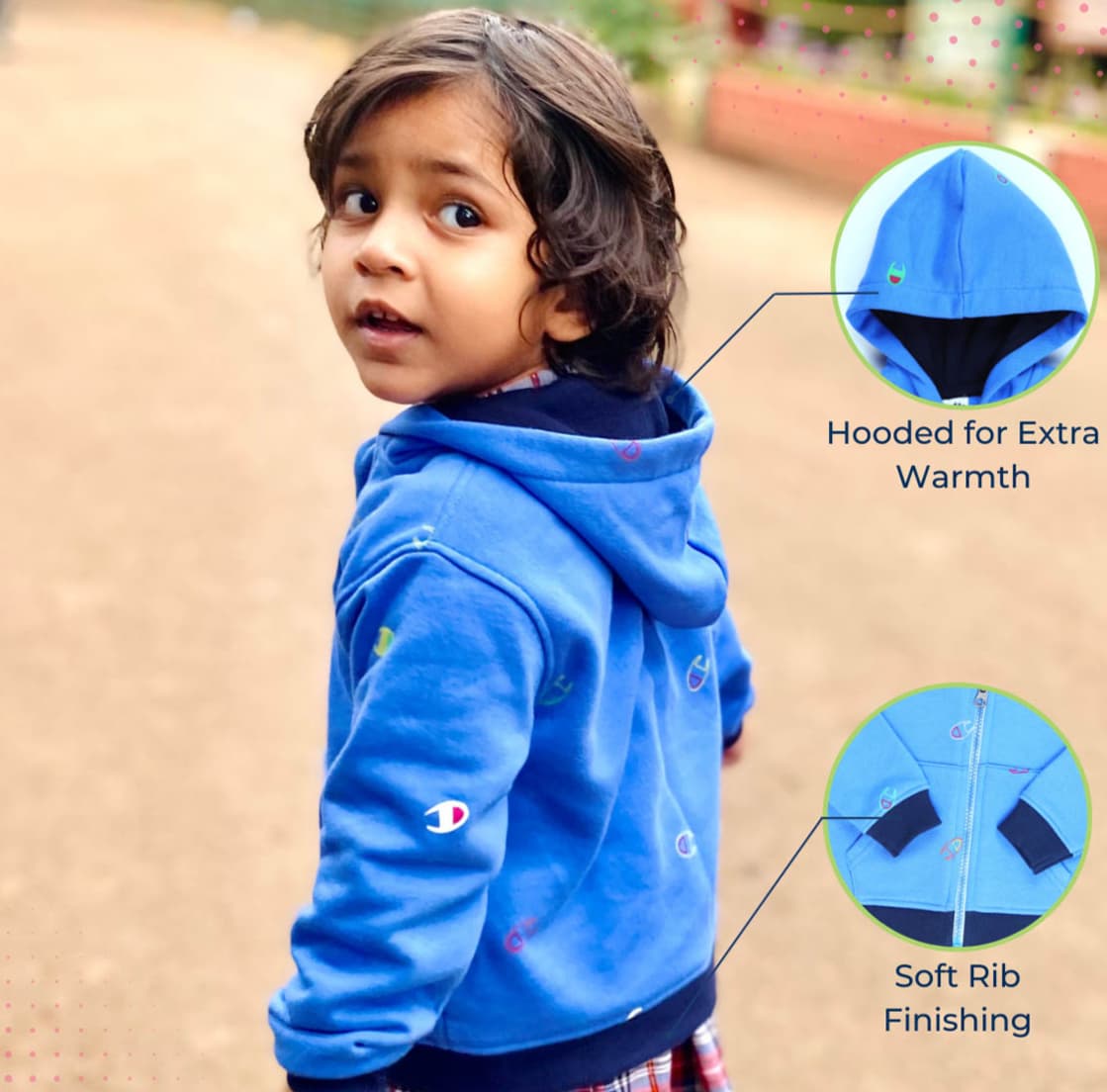 A child in a vibrant blue hooded jacket enjoys a stroll, showcasing its cozy hood for extra warmth and soft rib finishing for added comfort.