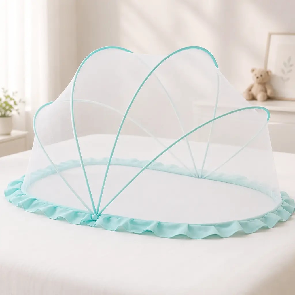 Mint green pop-up baby mosquito net opened on a bed
